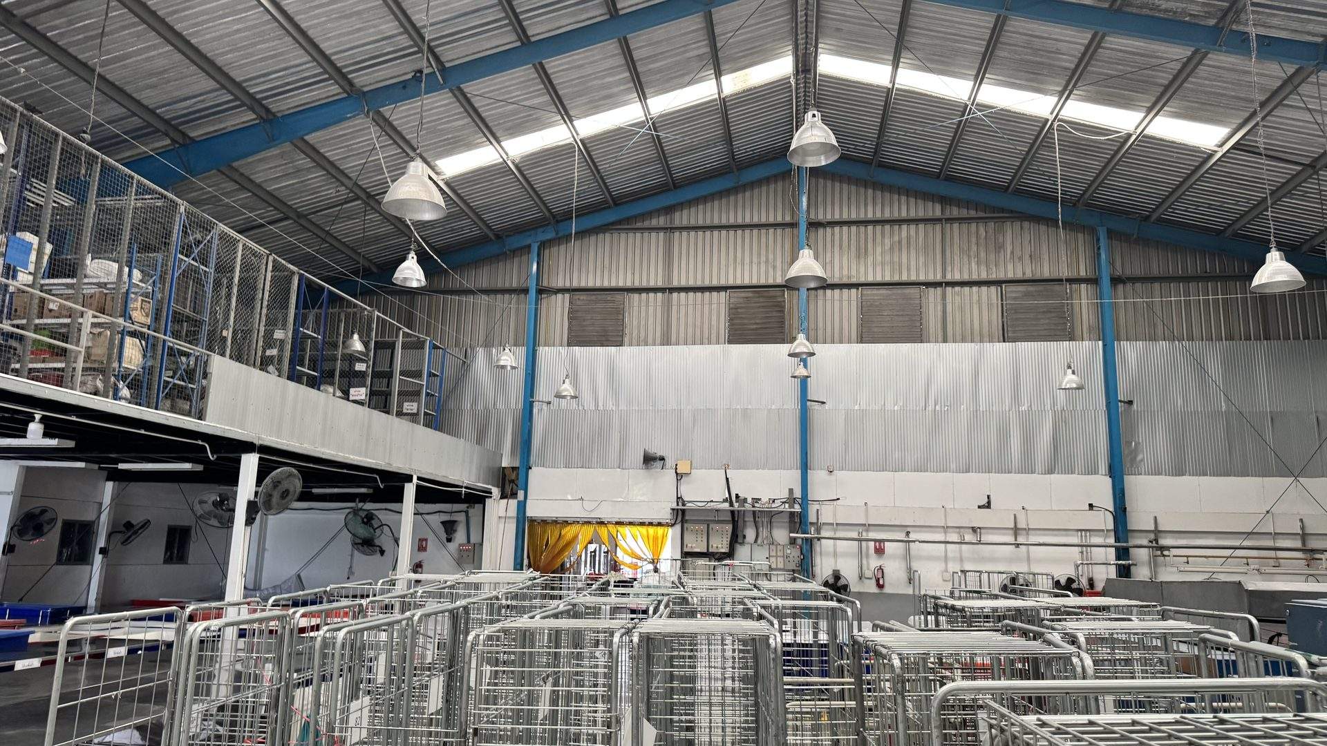 Ideal Laundry run as a dedicated production operation, with rows of linen handling carts across the plant floor